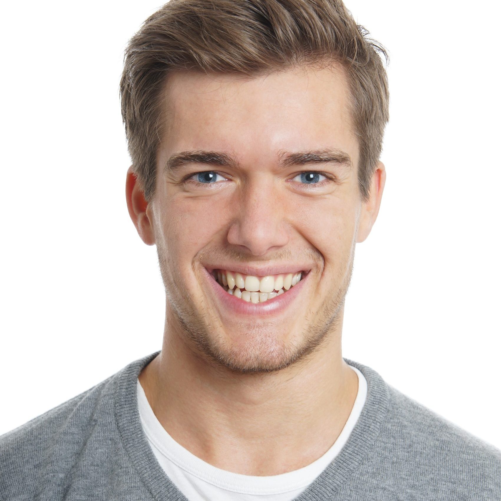 young man with toothy smile. isolated on white background